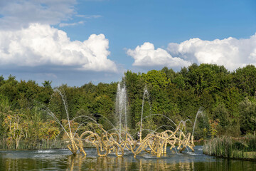 Beautiful musical fountains of the Palace of Versailles, landscape gardening art of France.