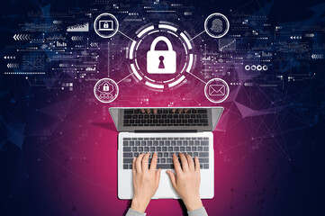 Internet network security concept with person using a laptop computer