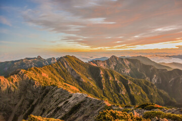 Naklejka na ściany i meble Panoramic View Of The Holy Ridge Aand Glacial Cirque At Sunrise On The Trail To North Peak Of Xue Mountain (Snow mountain) , Shei-Pa National Park, Taiwan