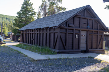 Rustic public restrooms and showers in the Old Faithful Lodge for campers and cabin guests to use during their stay