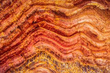 Pink and red waves in the rocks