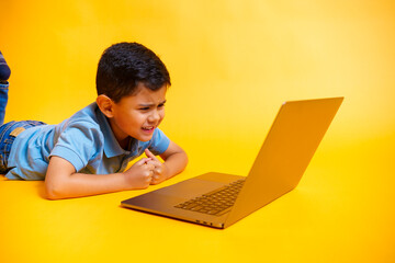 boy with vision problems looking at screen