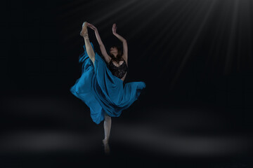 Fototapeta na wymiar woman dancing.ballet dancer in dress. dancer in a dress. dancer in a dress on a black background