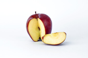 apples and slices on white background