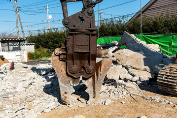 Large nibbler for demolition machine attachment, demolition work site, construction industry