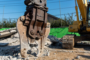Large nibbler for demolition machine attachment, demolition work site, construction industry