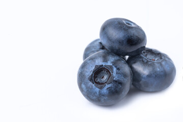 Blueberry berries close-up on a white background