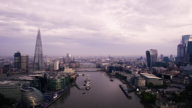 Aerial View Of Famous London Skyline Along River Thames In The Afternoon. Slow Dolly Forward