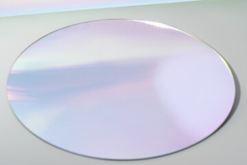 round mirror on grey background with trendy gradient reflection in lilac tones. Empty scene for...