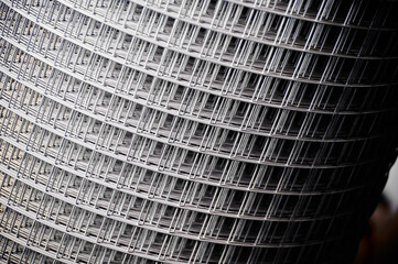 Roll of welded wire mesh in cold production plant storehouse - obrazy, fototapety, plakaty