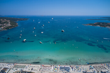 Sardinia famous beaches white sand clear turquoise water aerial view. Sardinia panorama clear water...