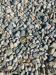 Fondo de piedras de playa en colores grises