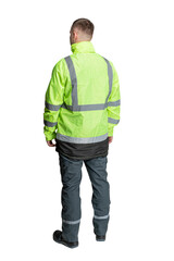 Naklejka premium a man in green special clothes for workers in a helmet on a white isolated background