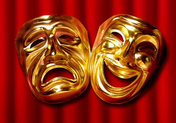 theatrical mask of tragedy and comedy over a red curtain - obrazy, fototapety, plakaty