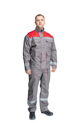 man in special clothes for workers on a white isolated background. a man in uniform