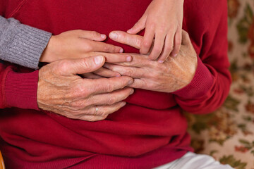 Hands of senior man and a child, care and support