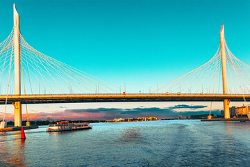 Obraz premium Cable-stayed bridge Western high-speed diameter across Peter's fairway in St. Petersburg at sunset, Russia
