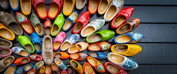 Fotobehang Set of different colorful vintage Dutch wooden clogs © Iryna