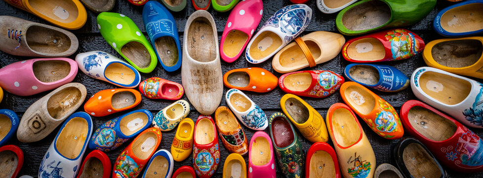 Set of different colorful vintage Dutch wooden clogs
