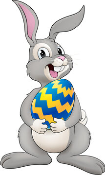 recommend clip art: An Easter bunny cartoon rabbit holding a giant Easter egg illustration