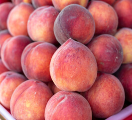 Peaches on the counter in the market.