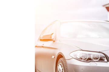 headlight front of modern prestigious car closeup