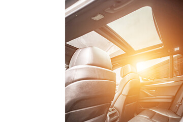 Obraz na płótnie Canvas Car inside. Interior of prestige modern car. Comfortable leather seats. Black cockpit with on isolated white background.