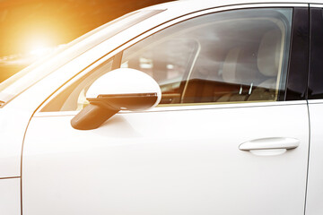 Door of modern car. Fragment of the door with handle, silver texture