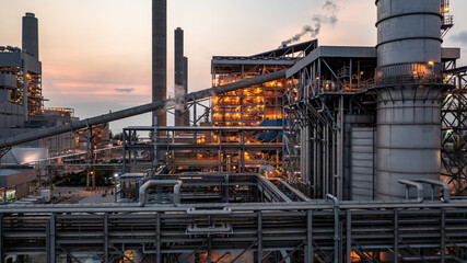 Aerial view coal power plant at dusk, Coal power station chimney pipes production electricity, Coal power plant in electricity generation.