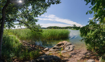 Summer landscape in Finland.Seaview with grass and rocks
