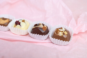 Set of healthy handmade chocolate candies close up. Natural diet vegetarian sweets. Vegan raw desserts. Healthy food