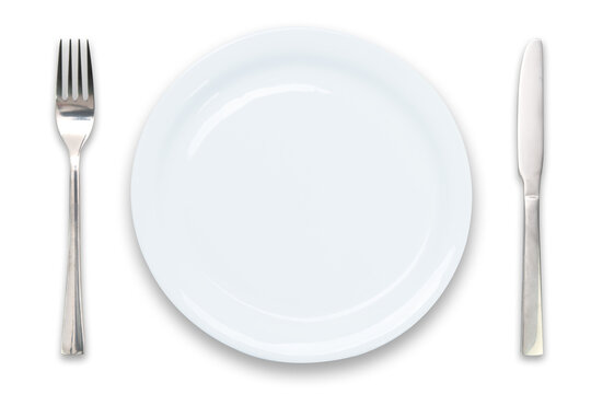 Cooking template - top view of an empty white plate with knife and fork isolated on a transparent  background