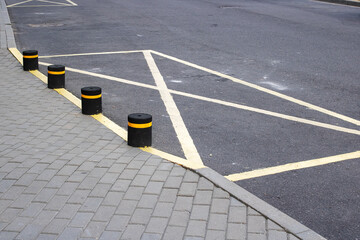 Sign on the asphalt with no parking