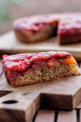 Plum pie. Rustic plum cake on a dark wooden background. High quality photo