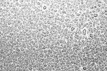 Texture of water drops on glass. Decorative abstract background