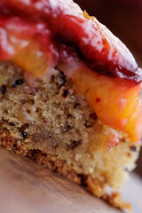 Plum pie. Rustic plum cake on a dark wooden background. High quality photo