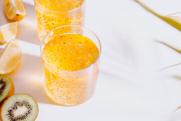 Refreshing summer drink in glasses, hard light with shadows