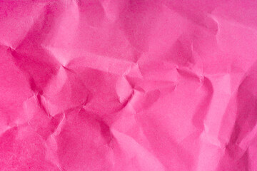 Texture from crumpled pink paper. Decorative background
