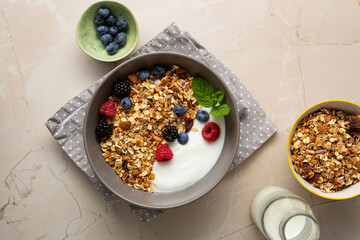 Overhead view of healthy grain granola with berry yoghurt top view