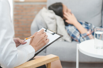 psychologist talking with depressed patient about mental condition.