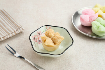 Kue Mangkok (Chinese fa gao) known as fortune cake, usually for Chinese New Year. Made from wheat flour and rice flour. Served on plate
