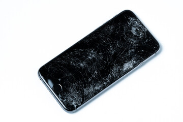 smartphone with broken screen isolated on white background