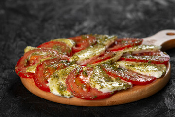 close-up view of delicious cheese and tomatoes