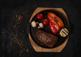 grilled pork steak with vegetables and spices