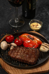 grilled pork steak with vegetables and spices