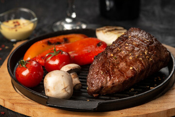 grilled pork steak with vegetables and spices