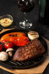 grilled pork steak with vegetables and spices