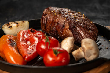 grilled pork steak with vegetables and spices