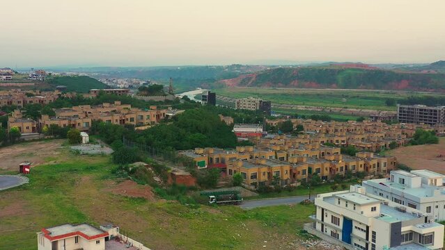 Drone view of modern houses and apartment complexes in Bahria Town, Islamabad, Pakistan
