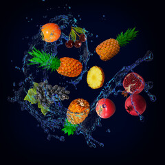 Obraz na płótnie Canvas Wallpaper with fruits in water - juicy pineapple, persimmon, pomegranate, grapes, apple are filled with pleasure